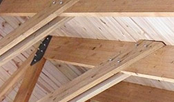 Laminated beams used in exposed roof trusses